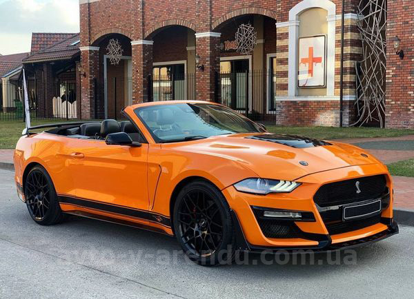 Аренда авто Ford Mustang GT оранжевый кабриолет с водителем. Прокат кабриолета Форд Мустанг GT без водителя в Киеве
